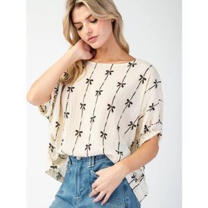 Anthropologie eesome Cream Blouse with Black Bow Print